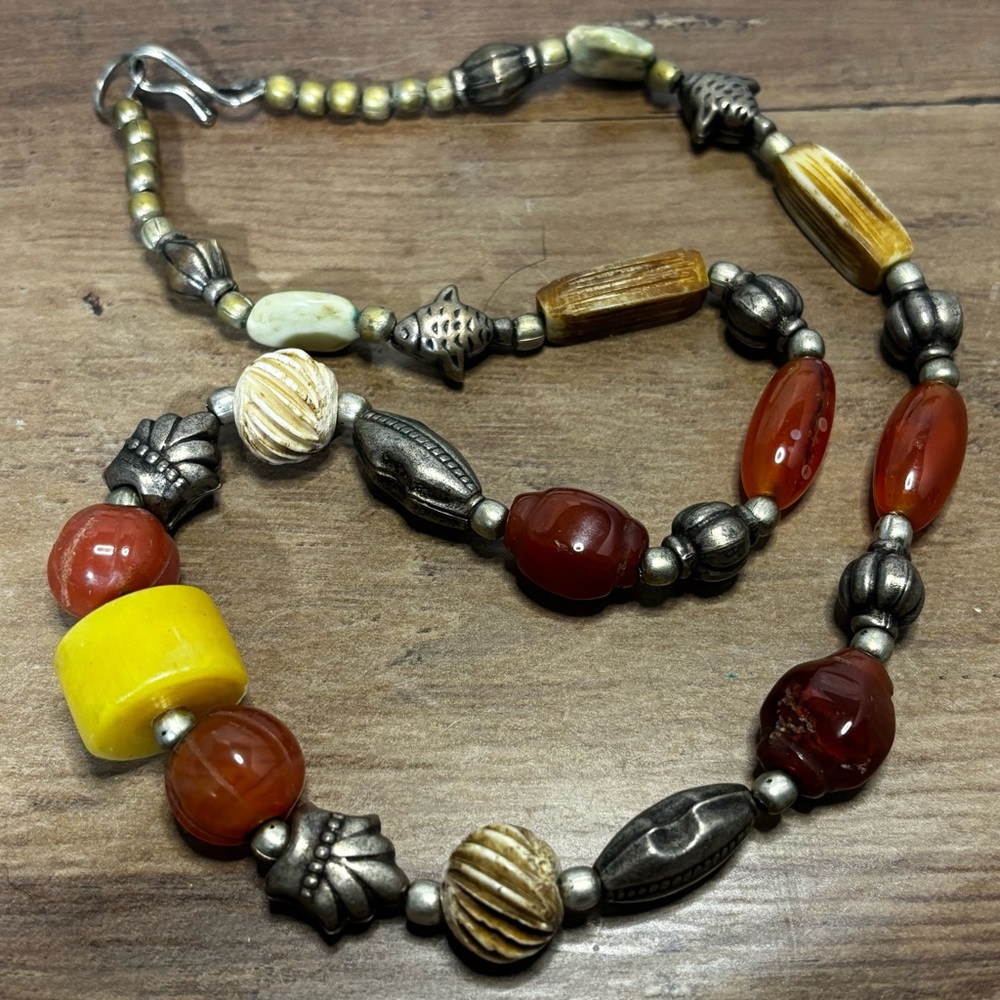 Artisan made necklace with Agate, Carnelian, metal, and bone beads